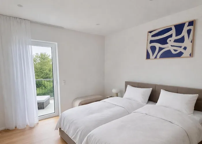 Сasa de vacaciones Design Seemoment Mit Kamin Und Panorama-seeblick *